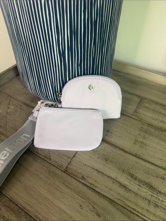 lululemon athletica Handbags - Lululemon dual Pouch Wristlet* Metallic Wordmark